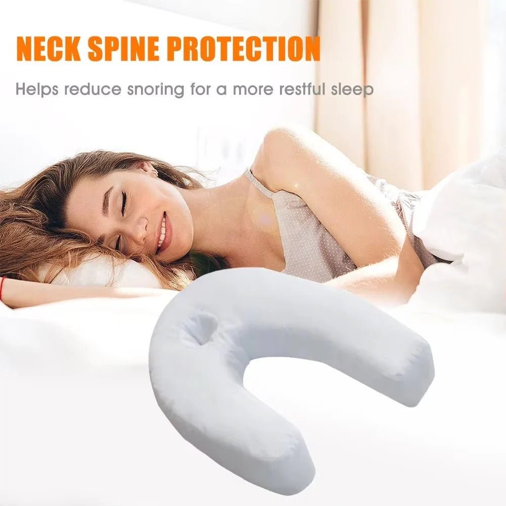 Woman sleeping on ergonomic body pillow