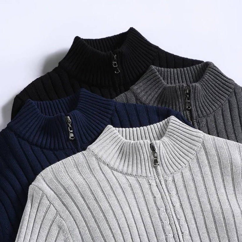 Men's zip front cardigan worn over a collared shirt for a semi formal look